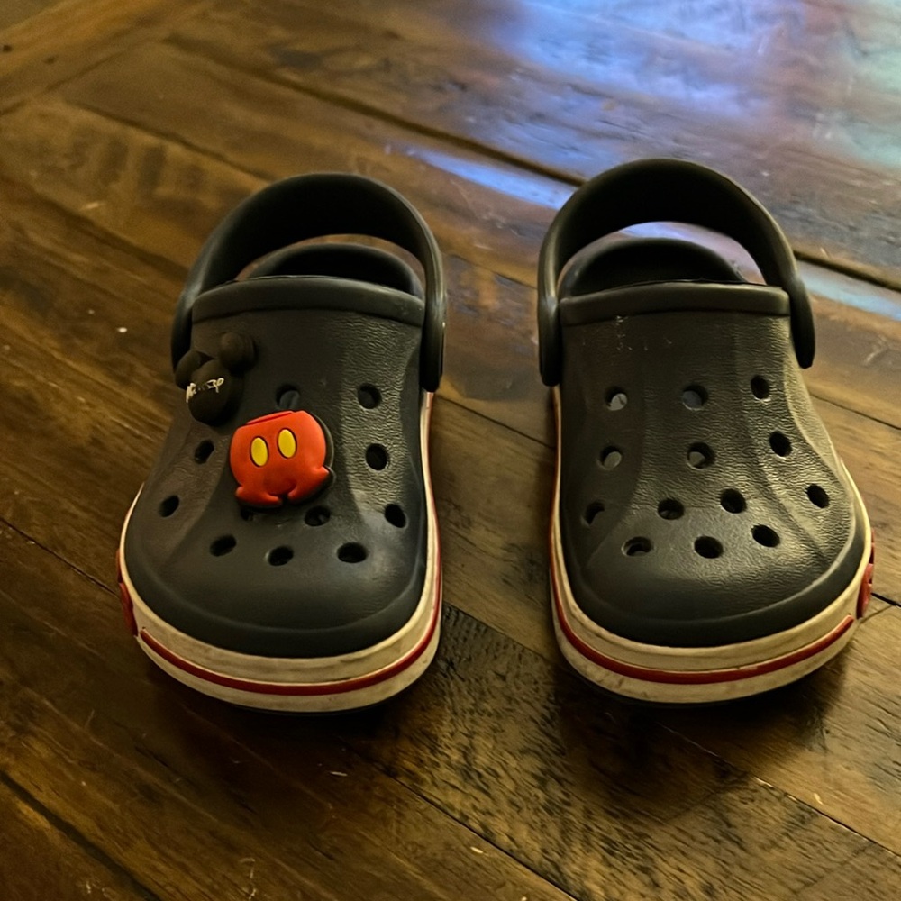 Size 6 Navy Blue Crocs with white / red stripe